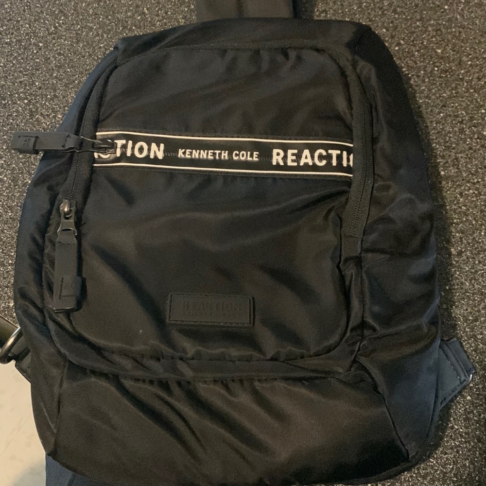 Kennth cole sling bag, used it one time it’s still like new.